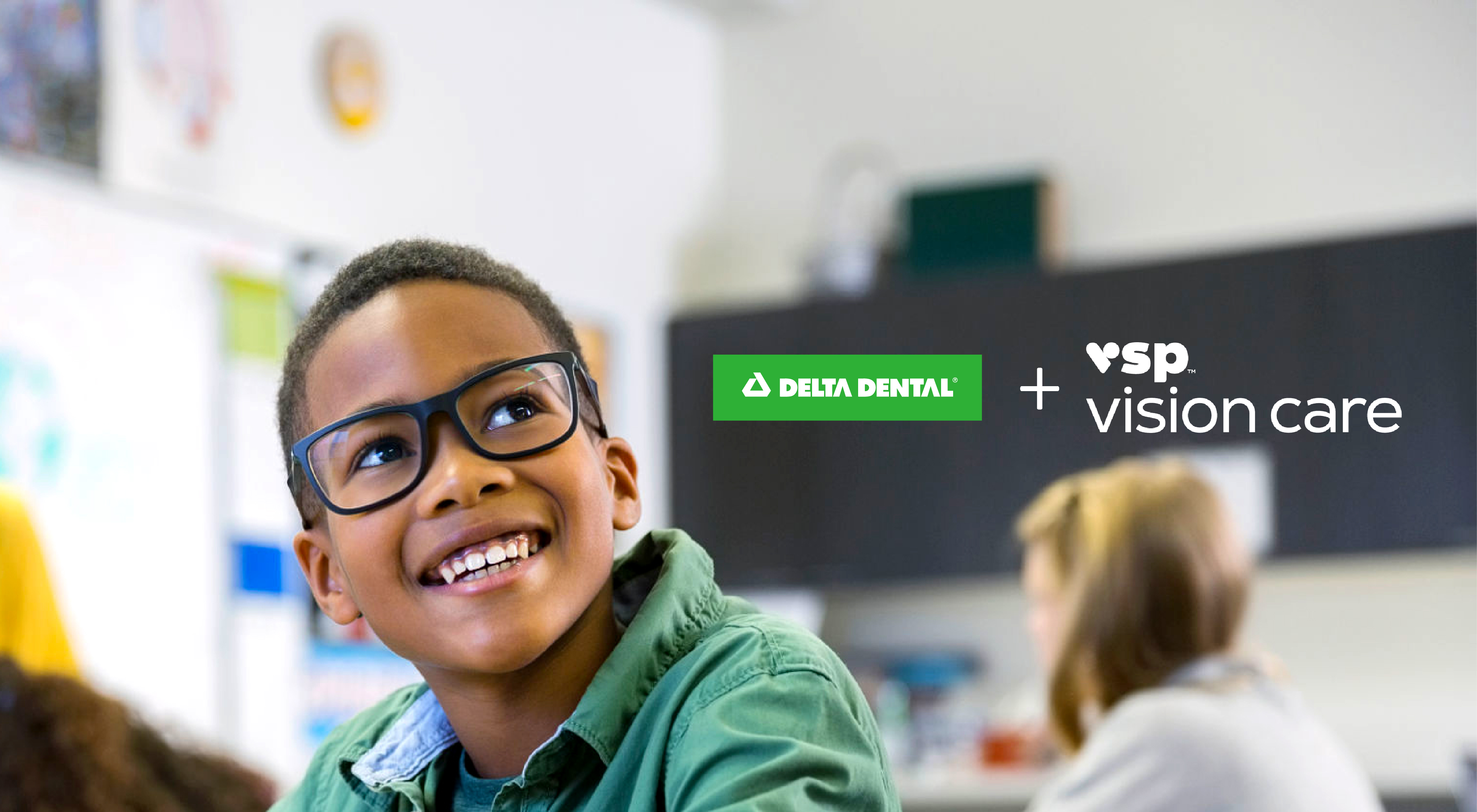 Smiling child with glasses with Delta Dental and VSP