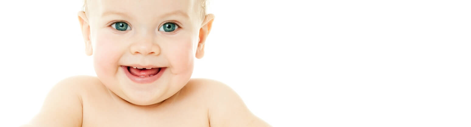 baby smiling showing a few baby teeth