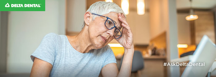 woman concerned about not being able to afford her dental treatment plan
