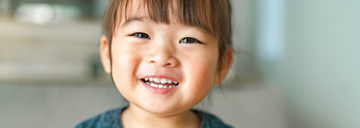 How to smile for pictures - little girl smiling
