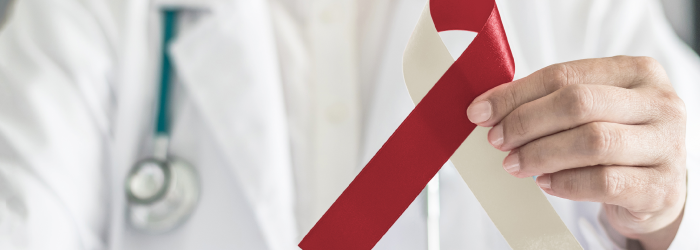 elderly woman holding medication