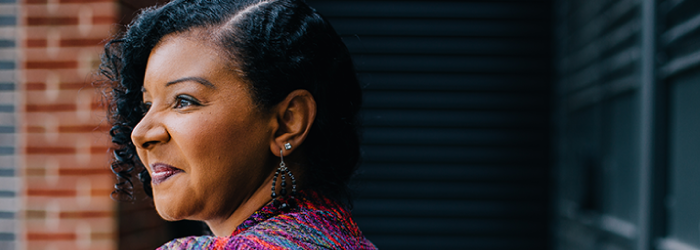 senior woman looking out the window