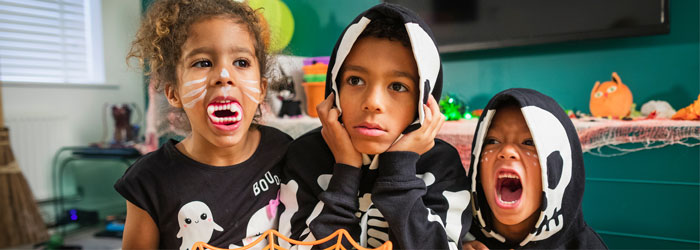 kids dressed in halloween costumes