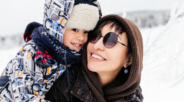 mom with daughter for dental benefits