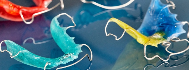 Different colored retainers