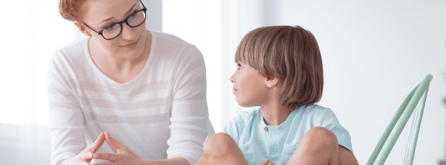man covering his mouth with blue sheet