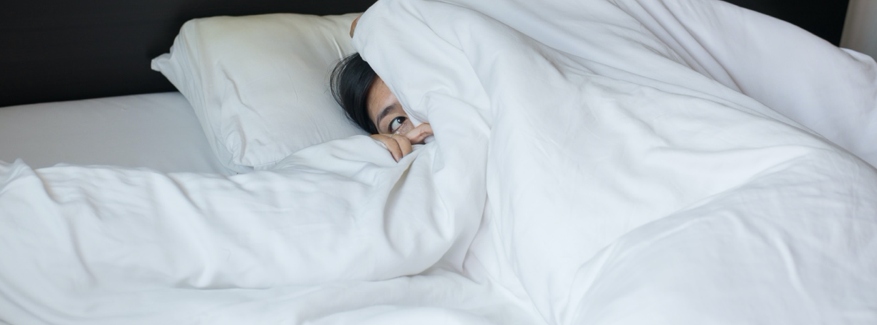 girl scared to leave bed