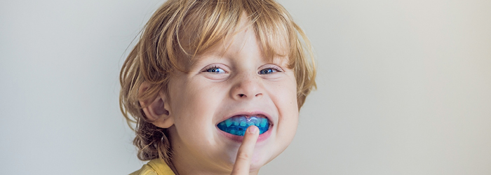 boy with mouthguard