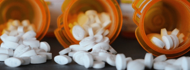 pill bottles spilling out