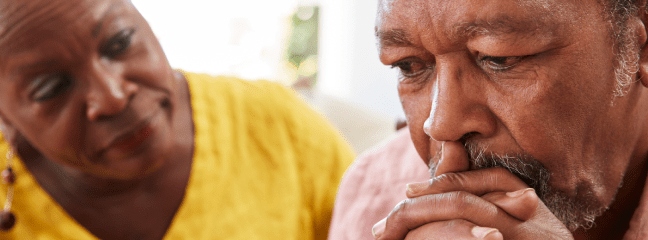 Woman watching anxious man