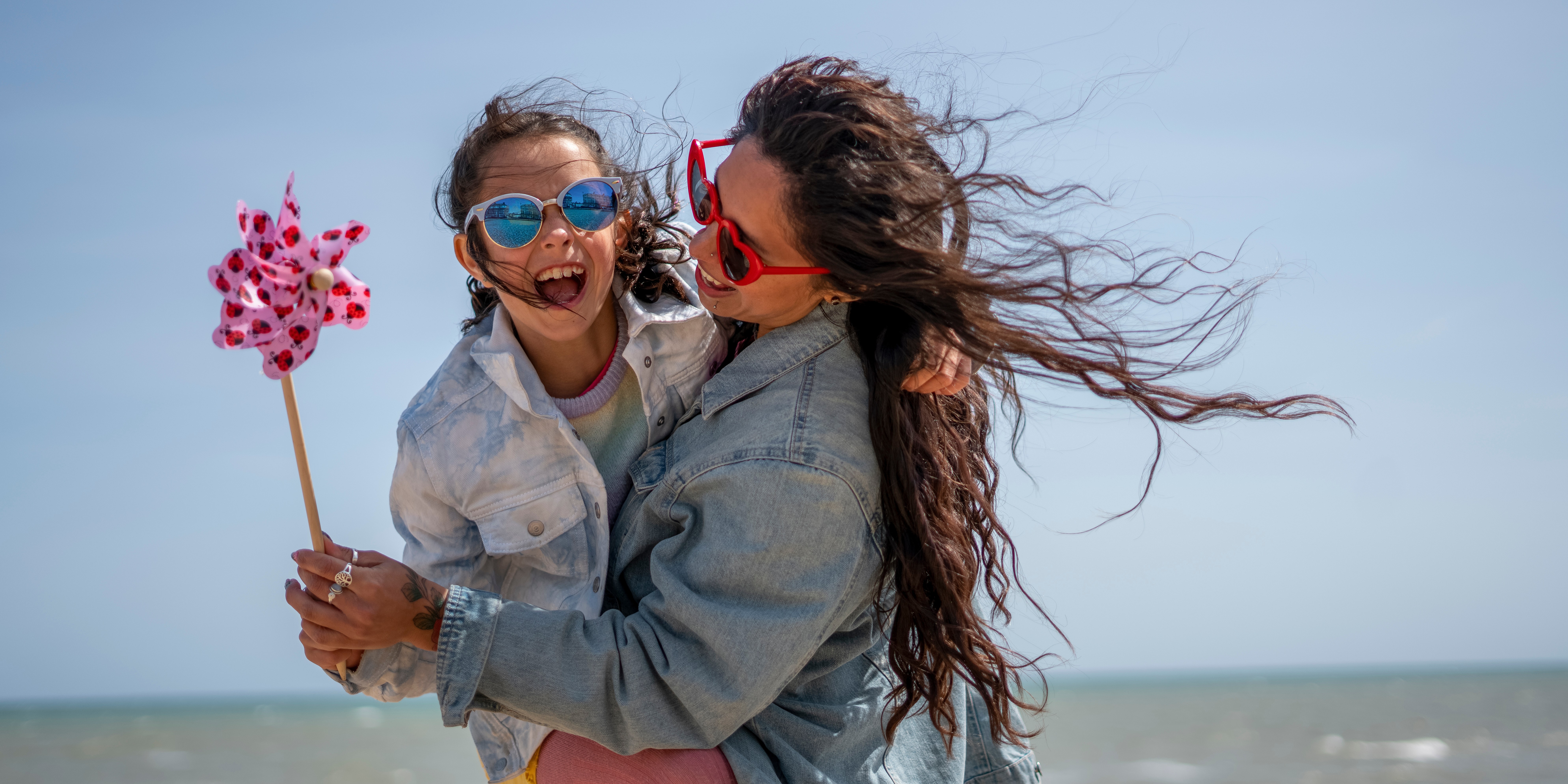 Mother daughter beach fun