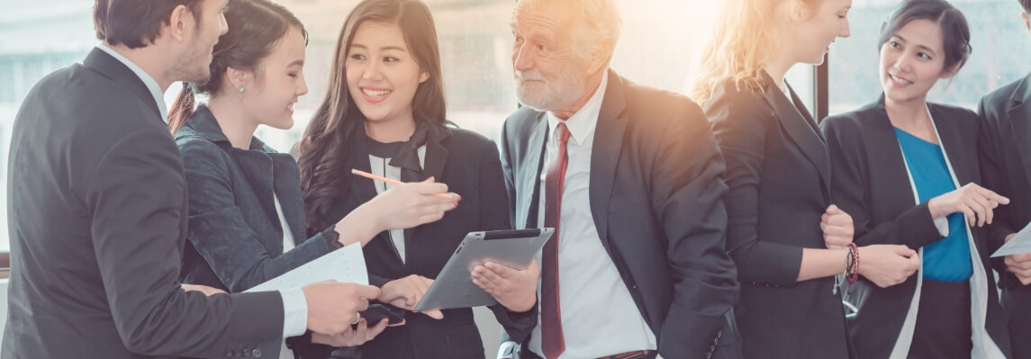 business men and women talking about partnerships